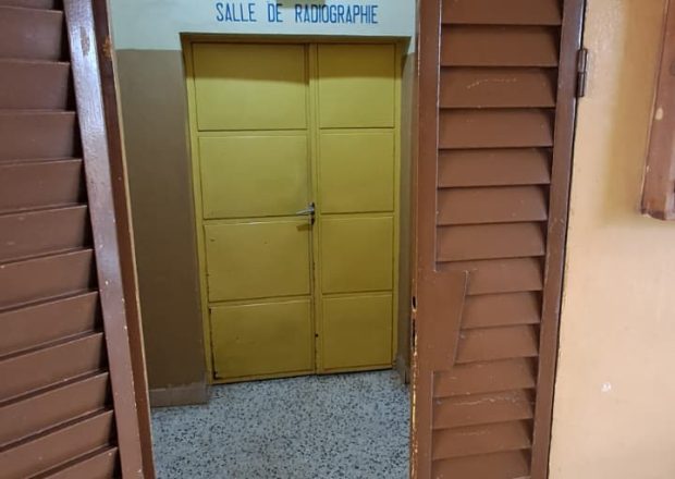Entrance to the Service d Imagerie Medicale and radiography room at the Benin healthcare facility